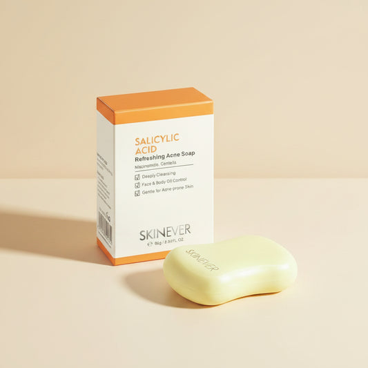 Skinnerver salicylic acid soap bar and packaging on a textured surface